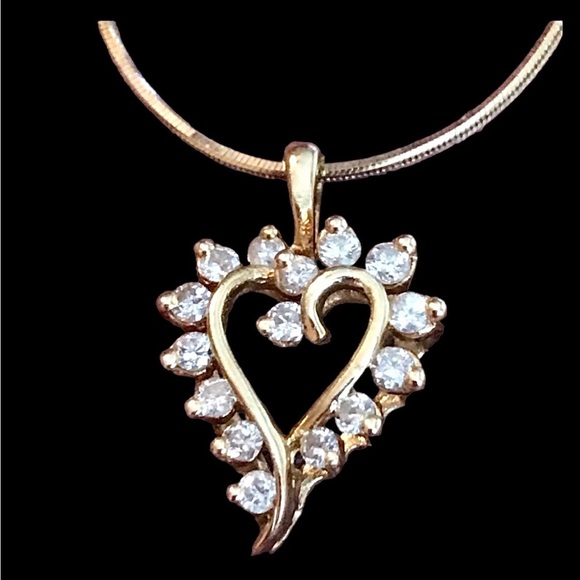 15 Real Diamonds Mounted In 14kt. Gold Open Heart Pendant